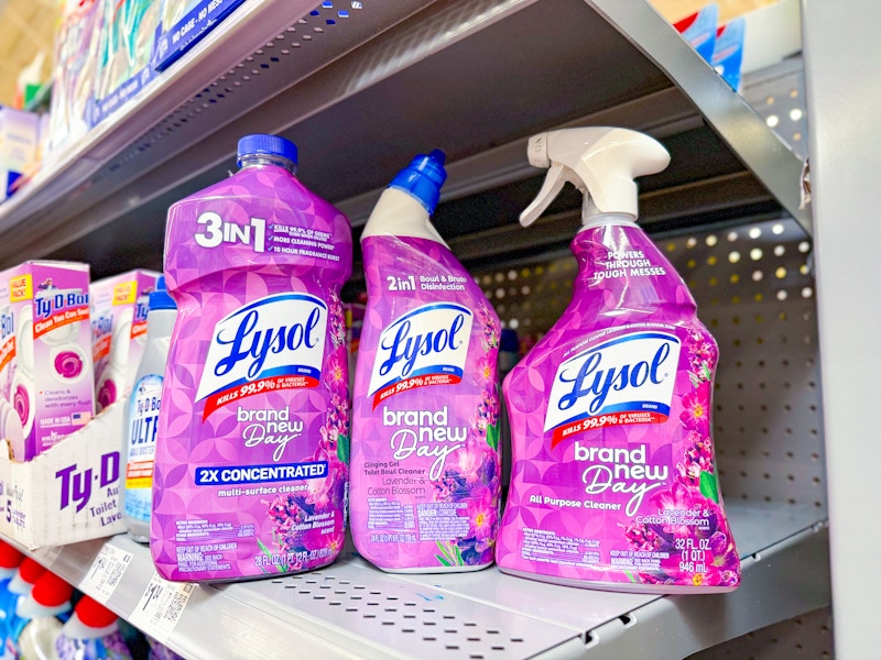 three bottles of lysol brand new day cleaners on walmart shelf