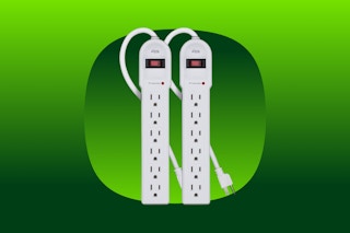 Two white surge protectors with short cords and six outlets each