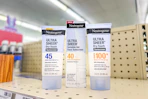 3 neutrogena sunscreens on a shelf