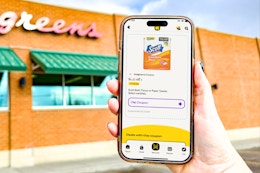 hand holding a smartphone displaying a 1-clip coupon