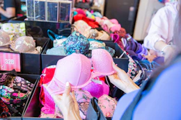 someone shopping bras at victoria's secret