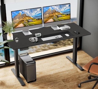 a black standing desk in an office