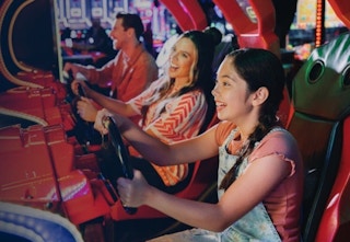 A little girl plays at Dave & Busters