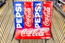 $4 Coca-Cola or Pepsi Soda 12-Packs at Kroger (B2G3 Free) card image