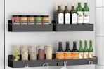 a magnetic spice rack against a fridge