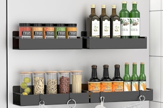 a magnetic spice rack against a fridge