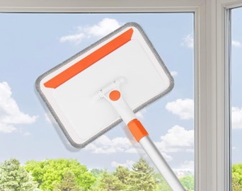 a wall mop on a window 