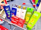 nivea men body wash, dove shampoo, garnier shampoo, and colgate toothpaste in a cart