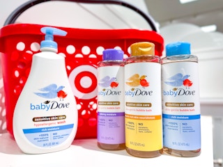 4 baby dove products sitting on a target in front of a target basket