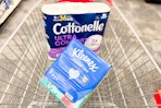 cottonelle toilet paper and kleenex tissues in a cart