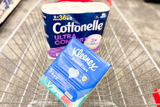 cottonelle toilet paper and kleenex tissues in a cart
