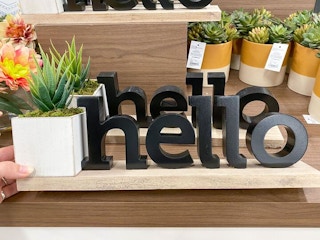 farmhouse hello decor on shelf