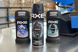Axe deodorant sticks and body spray on a Walmart check out counter