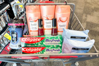 downy beads, suave shampoo, revlon nail polish, colgate toothpaste, and neutrogena wipes in a cart
