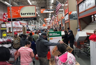 People shopping at Home Depot during Black Friday.
