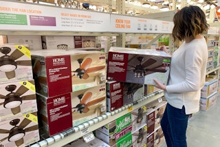 A woman looking at light figures.