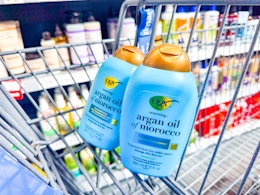 OGX argan oil of morocco shampoo and conditioner in a Walmart cart