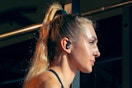 a woman wearing wireless earbuds