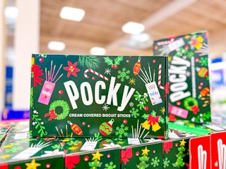 hand holding glico pocky variety pack