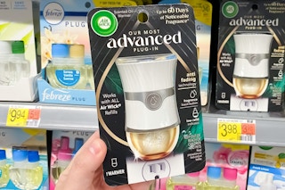 hand holding air-wick-advanced-warmer-at walmart