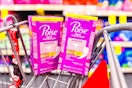 2 boxes of poise pantyliners in a cart