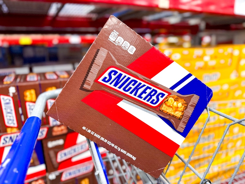 box of snickers candy bars in a cart