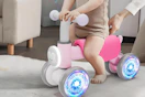 a toddler on a light-up balance bike