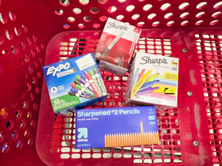 sharpie, expo, and up&up school supplies sitting in a target cart