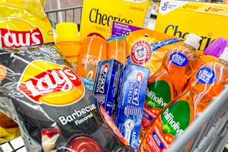 shopping cart filled with Lays, Cheerios, Crest, Palmolive, L'Oreal, and Arm & Hammer