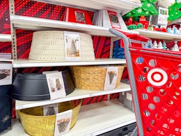 target cart parked in front of christmas tree collars on a shelf