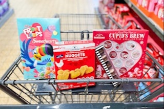 froot loops, kirkwood chicken nuggets, cupid's brew coffee in a shopping cart