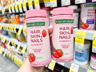 vitamins being held