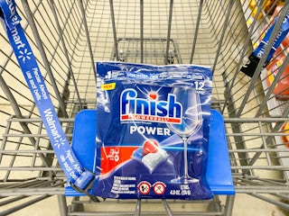 A 12-count bag of Finish Power Dishwashing Tabs in Walmart shopping cart
