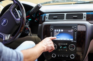 car dashboard showing sirius xm radio