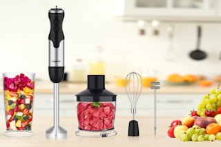 Keylitos 5 in 1 Immersion Hand Blender Mixer on a kitchen counter with fruit.