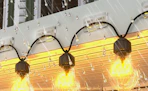 string lights on clips outside a house 