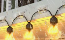 string lights on clips outside a house