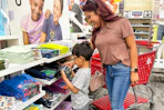 mother and son shopping at target for childrens clothes