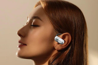 a woman wearing earbuds