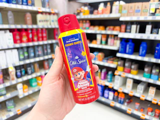 hand holding old spice super mario movie body spray in walgreens