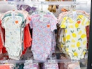 carter's baby apparel sitting on a target shelf