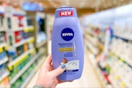 Nivea body wash being held in aisle