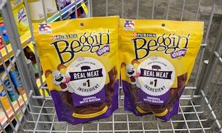 two bags of dog treats in a buggy