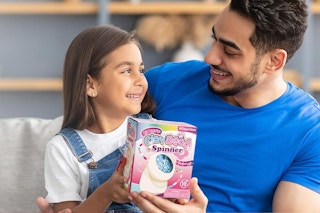 Parent and child holding product box