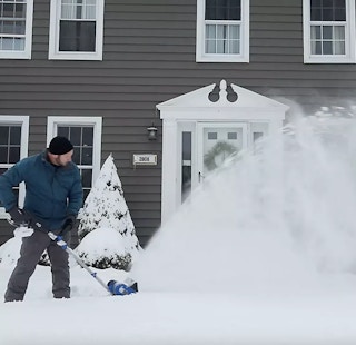 man shoveling snow