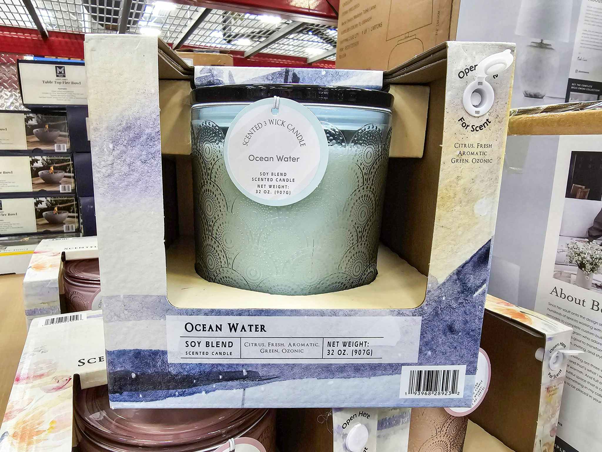 large jar candle on other candles