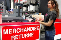 a person standing in front of return counter in costco
