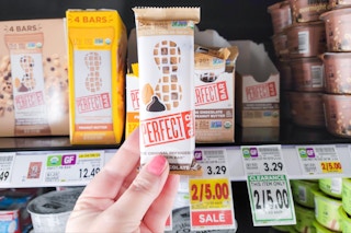 hand holding perfect bar at kroger