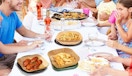 a table with food in air fryer liners