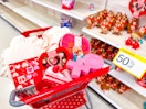 valentine's day clearance items sitting in a cart in front of target signage